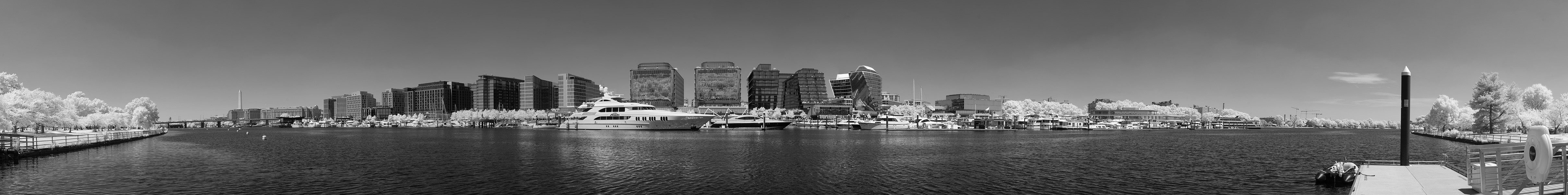 Very Wide Panorama of Waterway, Pleasure Boat Docks, and Buildings.
